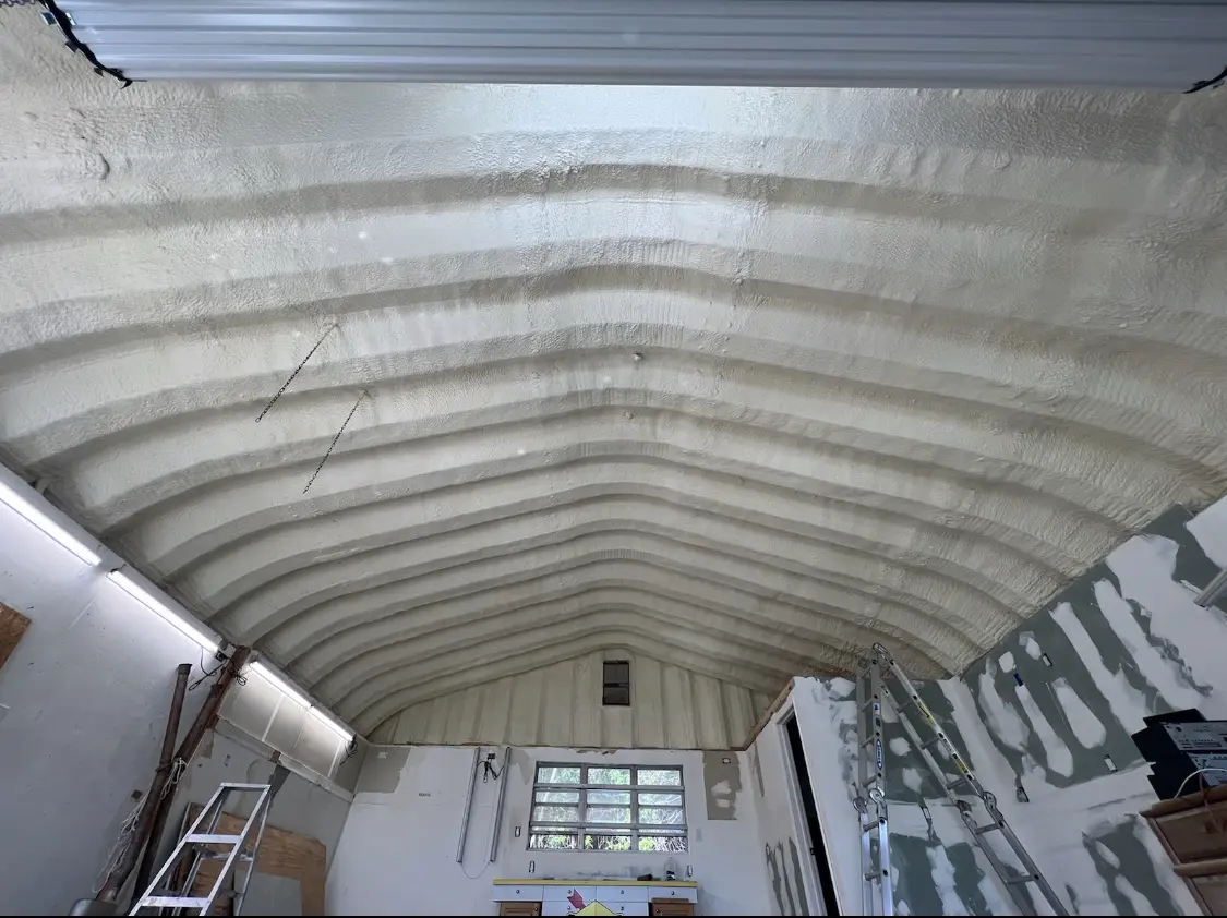 Spray polyurethane foam applied to the underside of a metal roof deck in West Bountiful